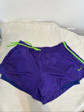 Nike Women's Purple Athletic Shorts with Neon Green Trim